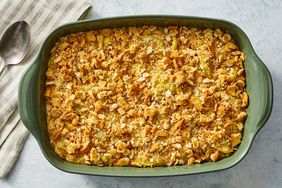 Old-School Squash Casserole in a green casserole dish