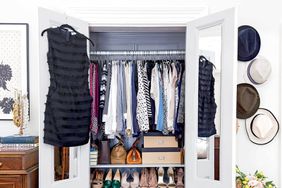 Small apartment closet storage for shoes and tops.