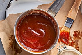 Texas BBQ Sauce in a bowl with a brush - Southern Living