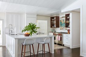 Bright White Kitchen with L-shaped Peninsula