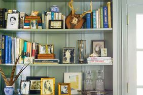 Wood Paneled Built-in Shelving with Family Photos