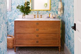 Wooden Vanity in Wallpaper Bathroom