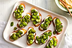 Southern Living Fava-and-Whipped Feta Bruschetta on a tray ready to serve 