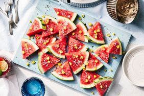 Southern Living Pepper Sauce Watermelon Wedges on a blue platter to serve