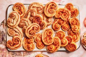 Southern Living Cheese Toast Palmiers on a platter to serve with Cinnamon Toast Palmiers