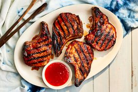 Pepper Jelly-Glazed Pork Chops on a white platter