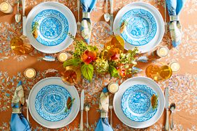 Blue printed plates with Fall floral centerpiece