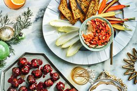 holiday party scene with appetizers and cocktails