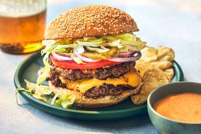 Southern Living Smashburgers With Secret Sauce on a plate to serve with chips