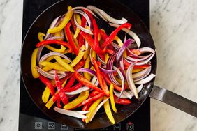 Southern Living Savory Veggie Fajitas cooking the peppers and onions