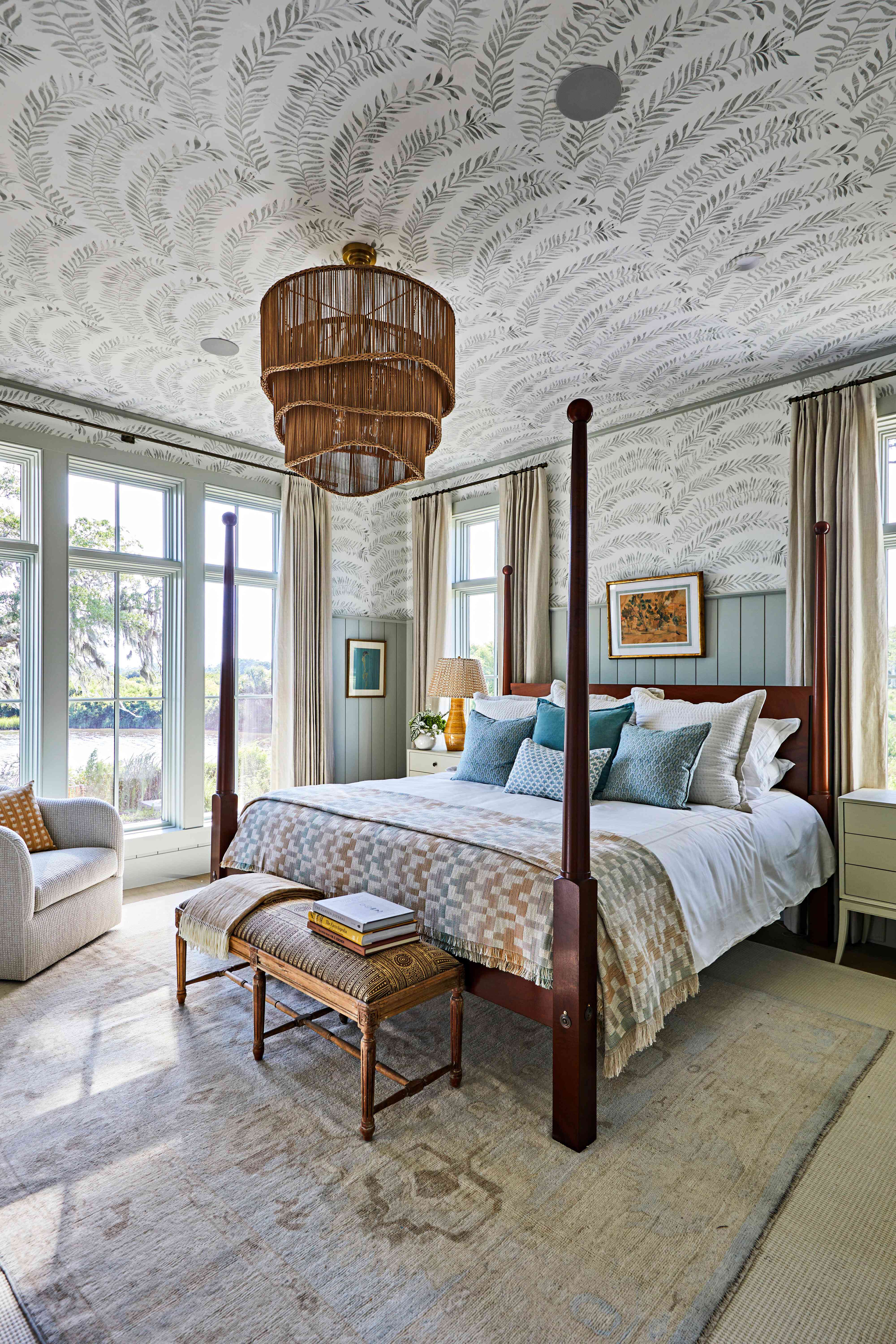 2024 Idea House Kiawah River primary bedroom with wallpapered walls ceiling