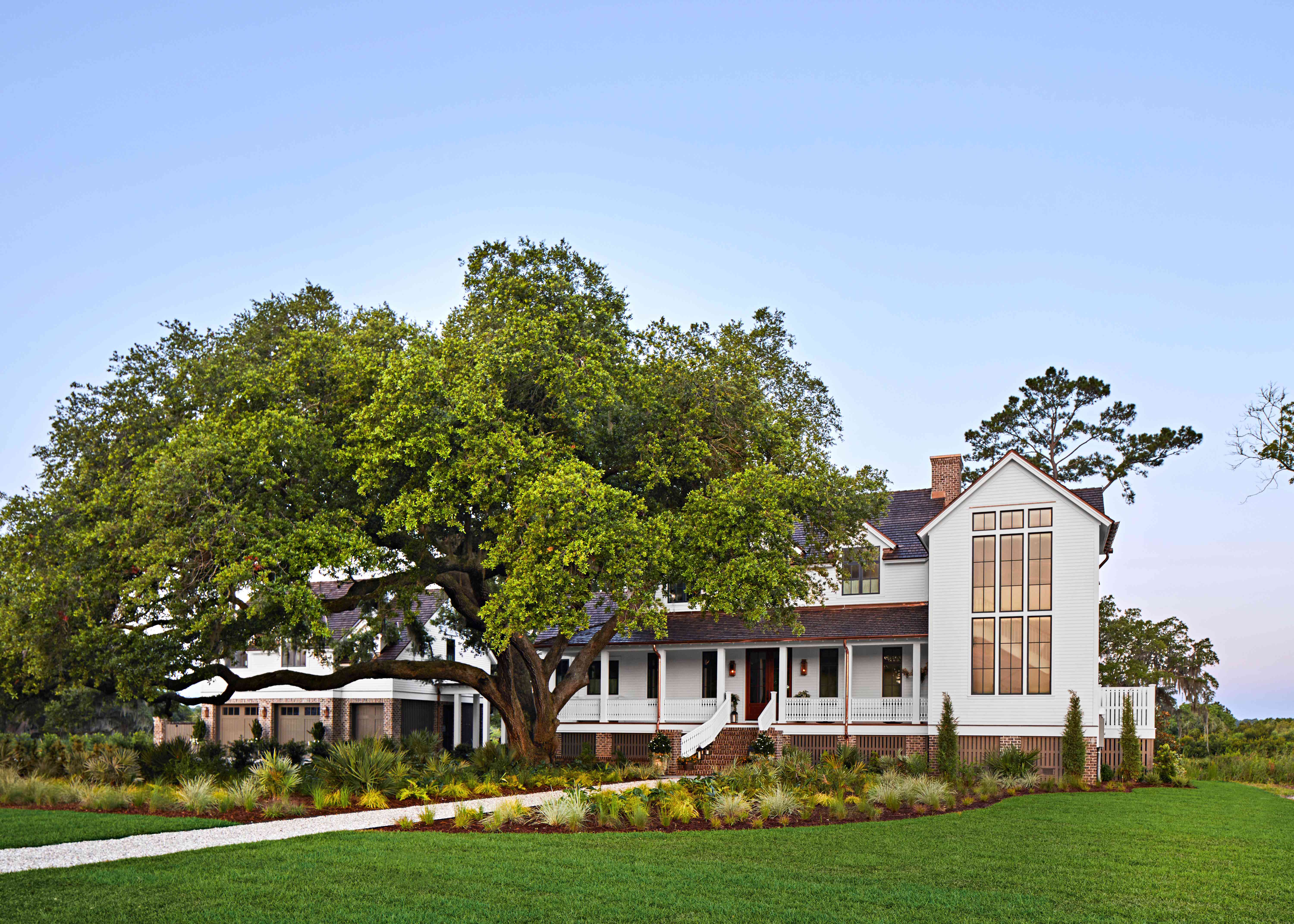 2024 Southern Living Idea House Kiawah River exterior white farmhouse