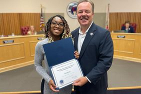 Rikki Blaylock was honored at a school board meeting for having perfect attendance for 13 years.