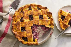 Southern Living Blueberry Pie ready to serve with a slice cupt out