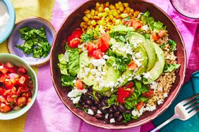 Burrito Bowl with toppings in small bowls nearby - Southern Living