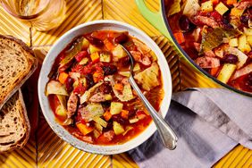 Southern Living Cabbage Soup in a bowl to serve with the pot nearby