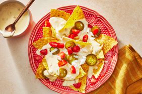 Southern Living Cheese Sauce on a plate to serve with nachos