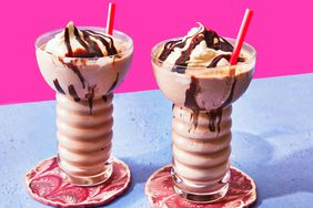 chocolate milkshake - two glasses with straws