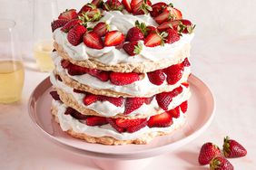 Southern Living Fresh Strawberry Meringue Cake on a cake plate to serve