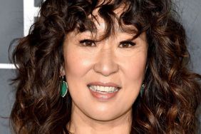 Sandra Oh curly bangs and shoulder-length hair