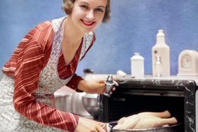 woman in an apron cooking