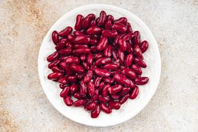 canned red beans on a white plate