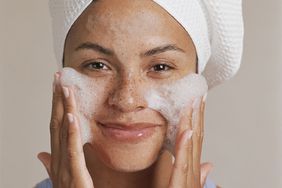 Woman Washing Face