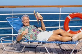 older gentleman relaxing on a chair on a boat deck