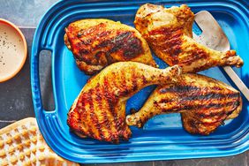 Southern Living Grilled Chicken Legs ready to serve with the sauce