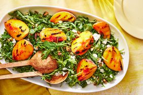 Southern Living Grilled Peach and Arugula Salad on a platter to serve 