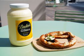 Jar of Duke's Mayonnaise with a pretzel