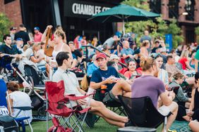 A crowd gathers at Chamblee City Hall in Chamblee, Georgia, for the Chamblee Rocks Summer Concert Series