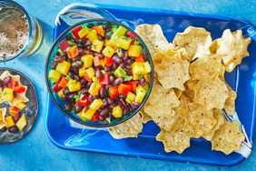 Southern Living Mango Black Bean Salsa in a bowl to serve with tortilla chips on the side