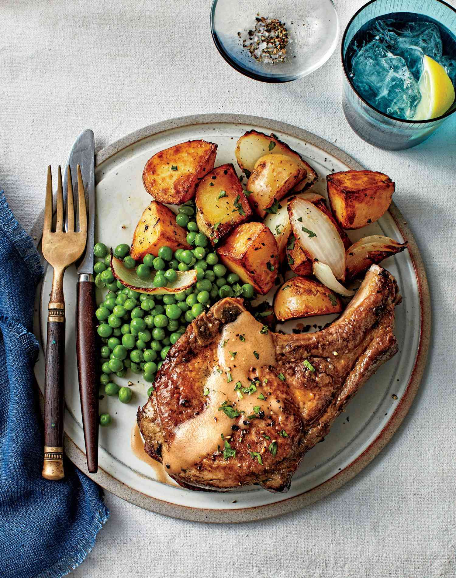 Fried Pork Chops with Peas and Potatoes