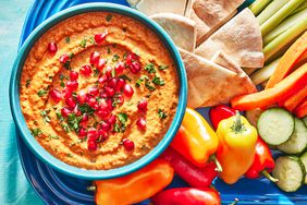 Southern Living Muhammara on a platter to serve with vegetables and pita bread