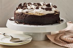 Southern Living Oreo Cheesecake on a cake plate to serve