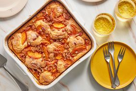 Peach Cake with plates and glasses and forks