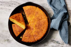 Southern Living Skillet Cornbread cut into wedges to serve