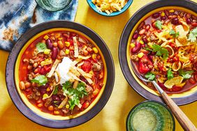 slow-cooker taco soup in two bowls with cheese - Southern Living