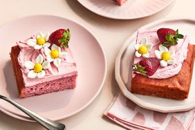 Southern Living Strawberry Patch Cake sliced on plates to serve