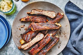 st. louis ribs on a gray plate - Southern Living