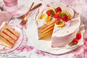 Southern Living Strawberry Lemonade Cake with a slice out to serve