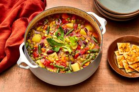 Southern Living Homemade Vegetable Soup in the pot to serve with Cheesy Saltines beside