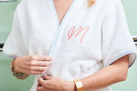 Woman wearing Weezie monogram bath robe