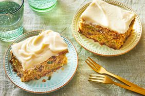 Southern Living Zucchini Cake sliced on plates to serve